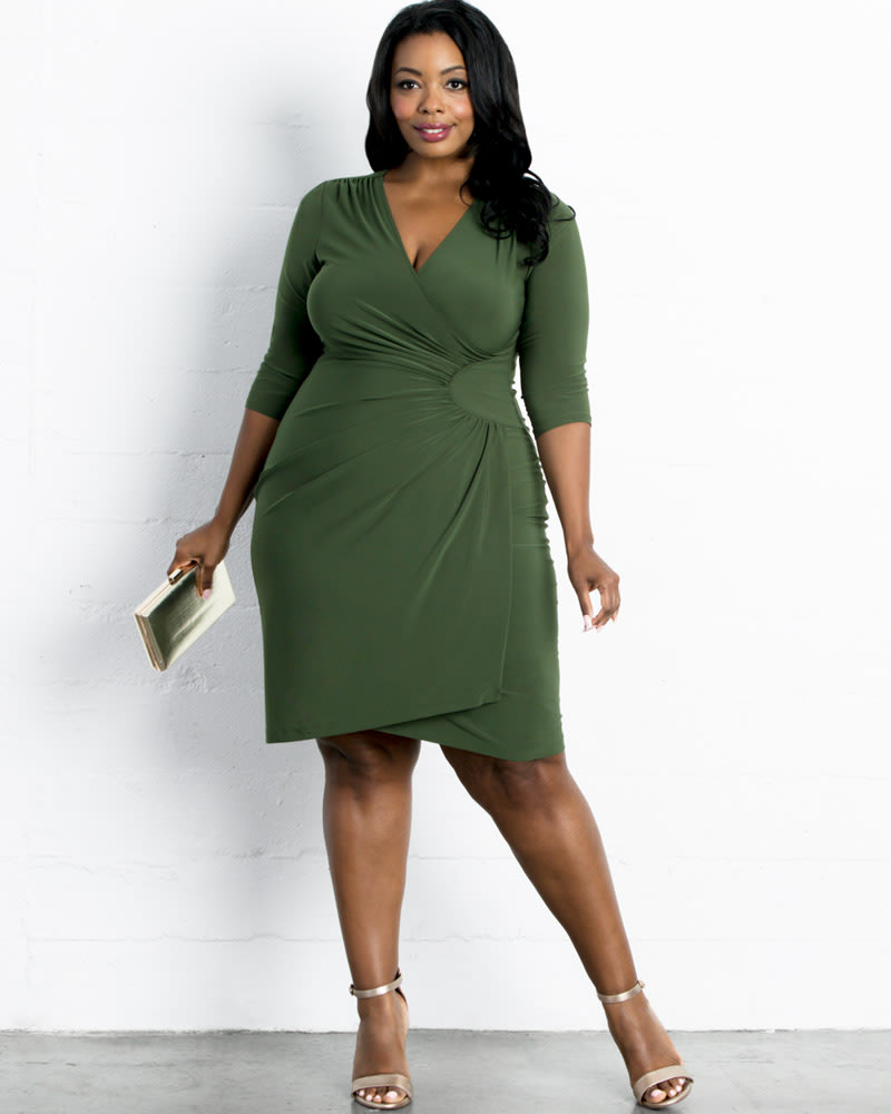Front of a model wearing a size 0X Ciara Faux-Wrap Dress in OLIVE by Kiyonna. | dia_product_style_image_id:227604